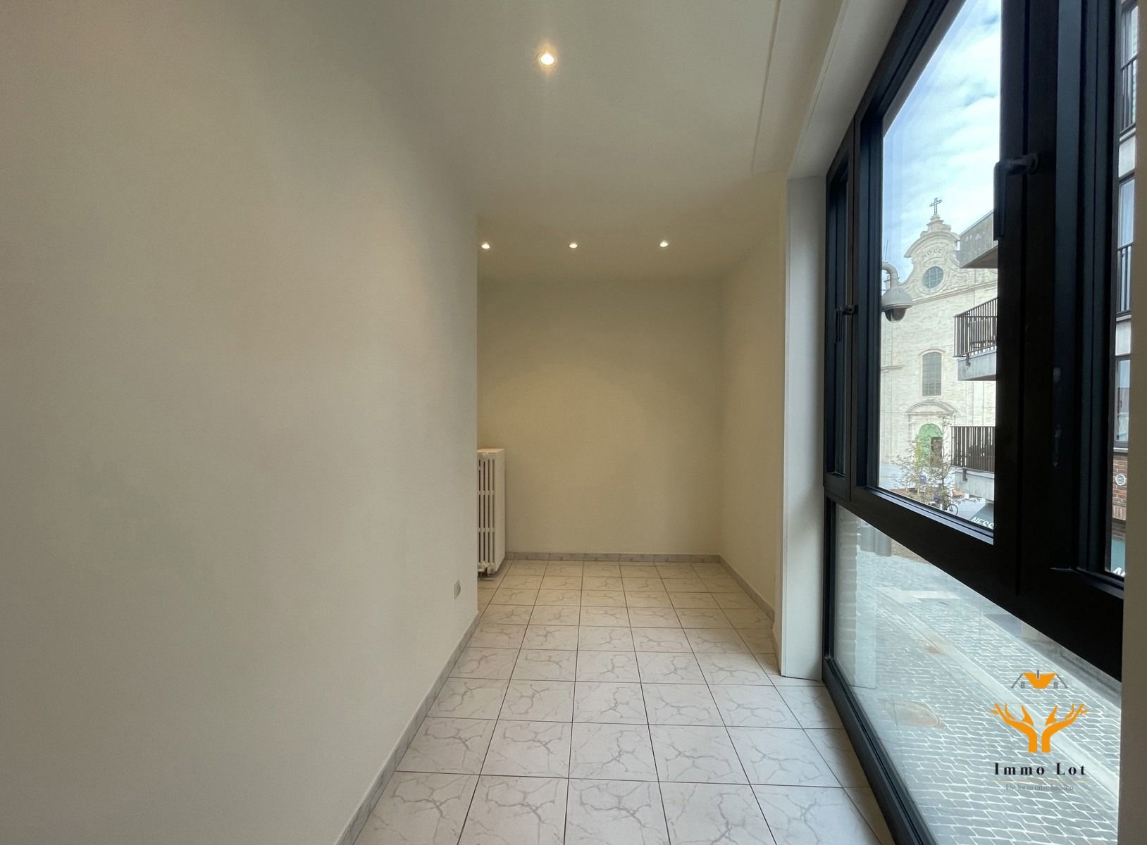 TE HUUR: Gerenoveerd appartement op Markt Zele foto 11