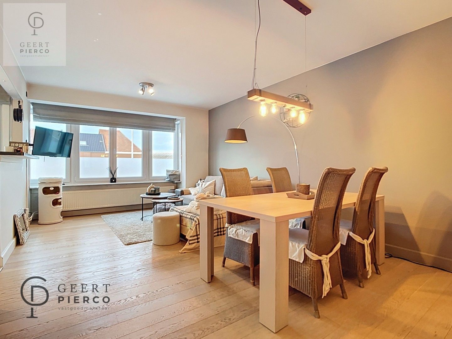 Gerenoveerd appartement met twee slaapkamers, ruim terras en ondergrondse staanplaats aan de stadsrand van Tienen. foto 3