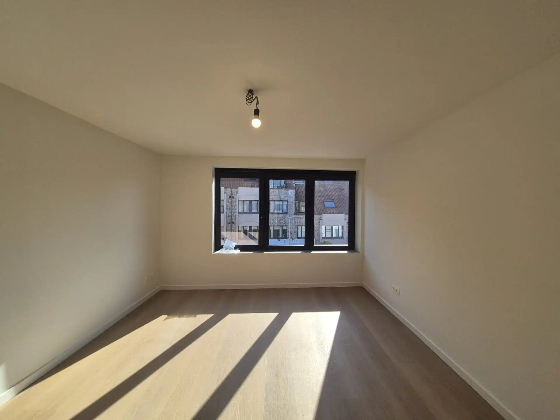 Ruim triplex appartement met polyvalente ruimte op toplocatie in het hart van Wetteren foto 14