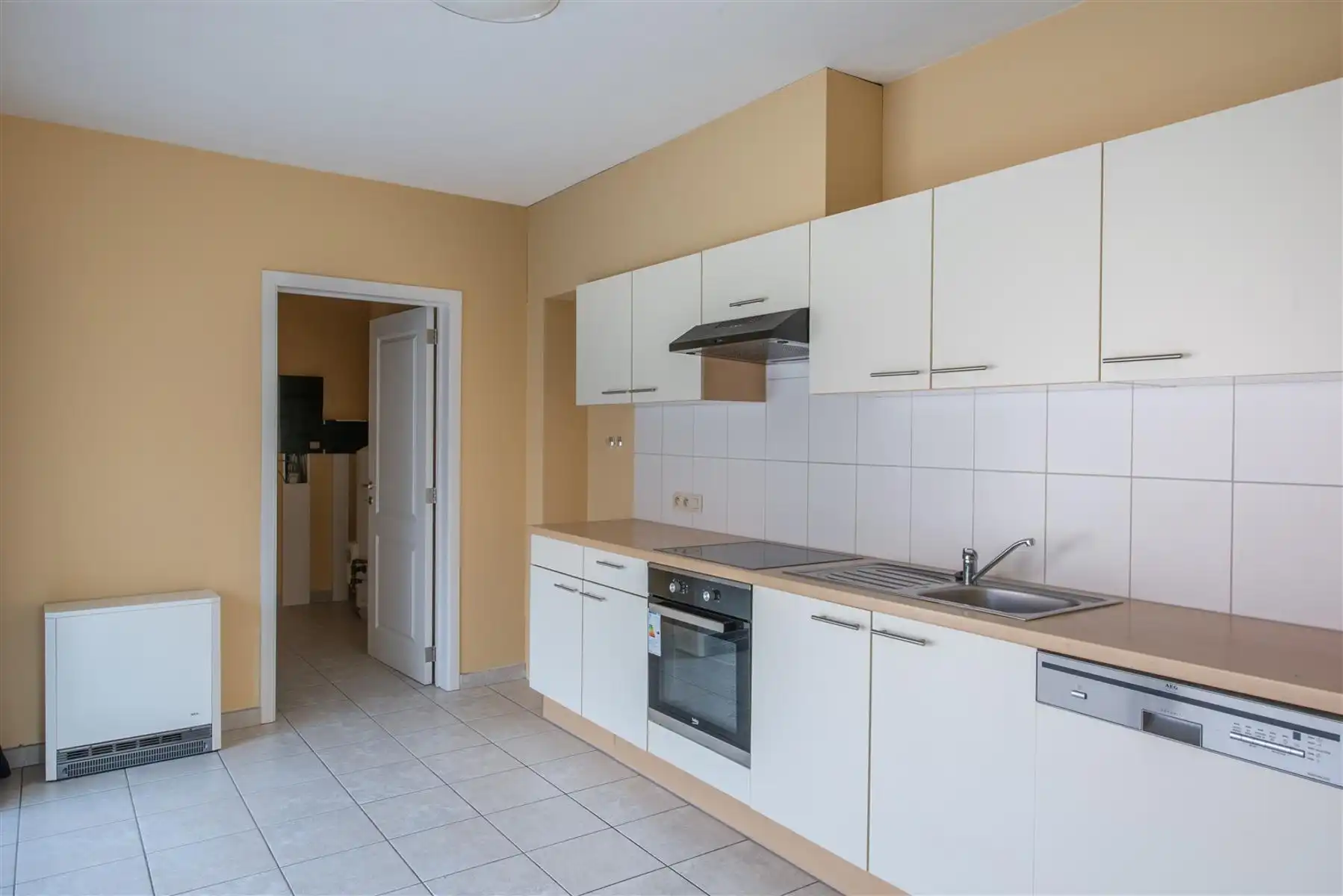 Appartement met parkeerplaats en terras foto 7
