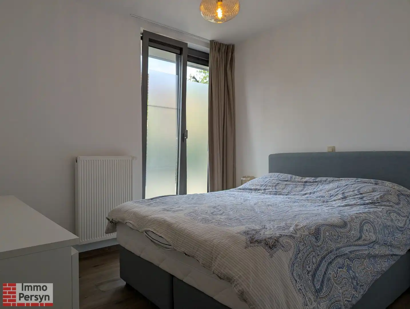 Gelijksvloer appartement met tuintje foto 16