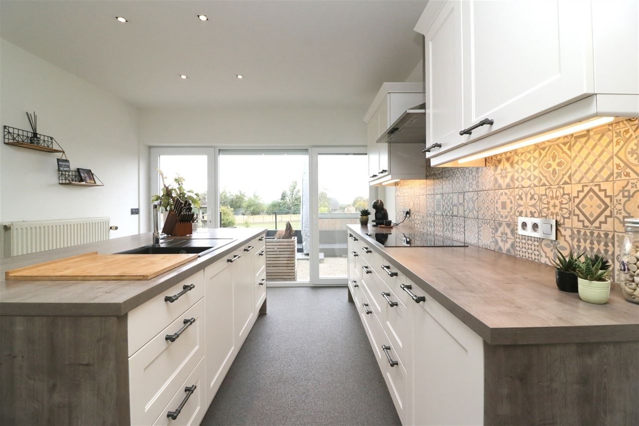 Tijdloos wonen in alle rust en comfort. Open groen uitzicht. Label B.  foto 4