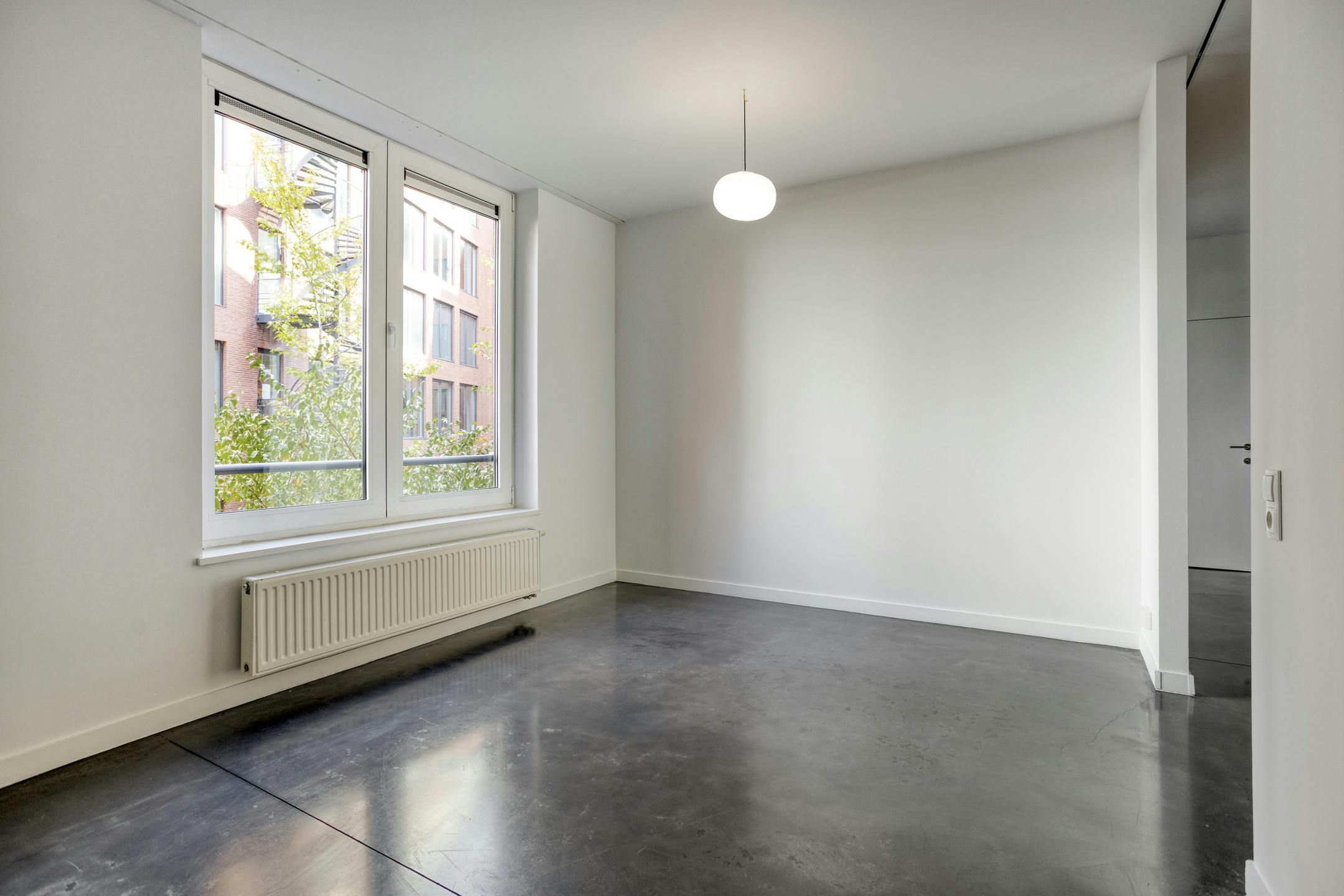 Lichtrijk appartement 'loftstijl' in hartje Brussel foto 10