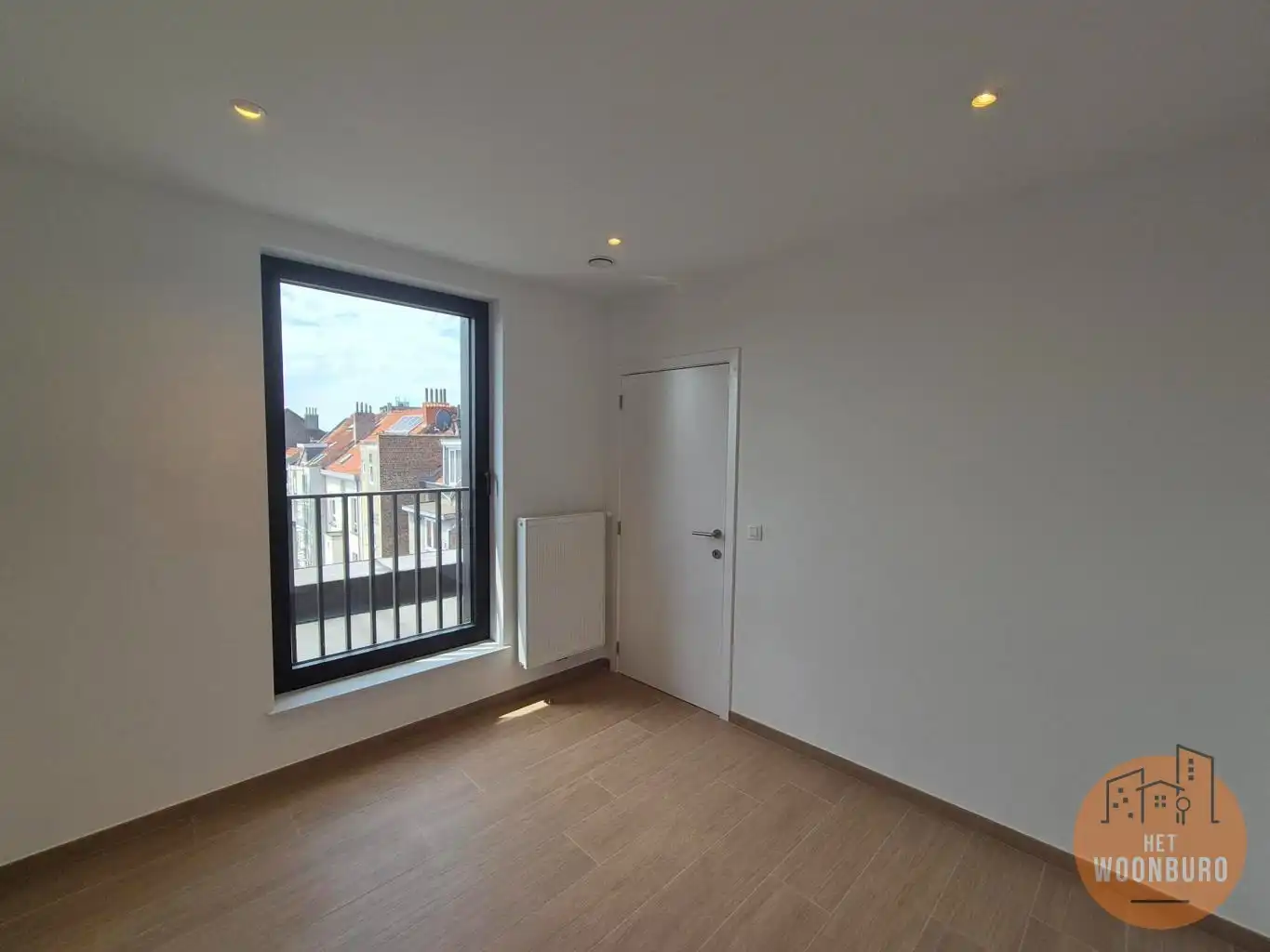 Nieuwbouw duplex met 2 slpks, bureel, terras en kelder foto 8