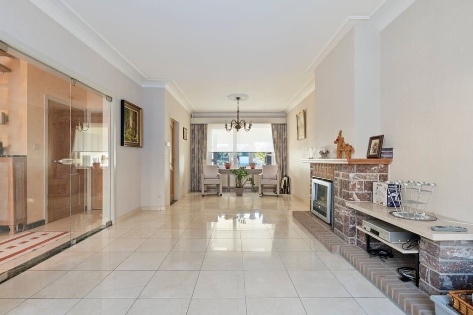 CHARMANTE, INSTAPKLARE WONING MET 3 SLAAPKAMERS, GROTE ZOLDER EN GEEZELLIGE BUITENRUIMTE foto 10