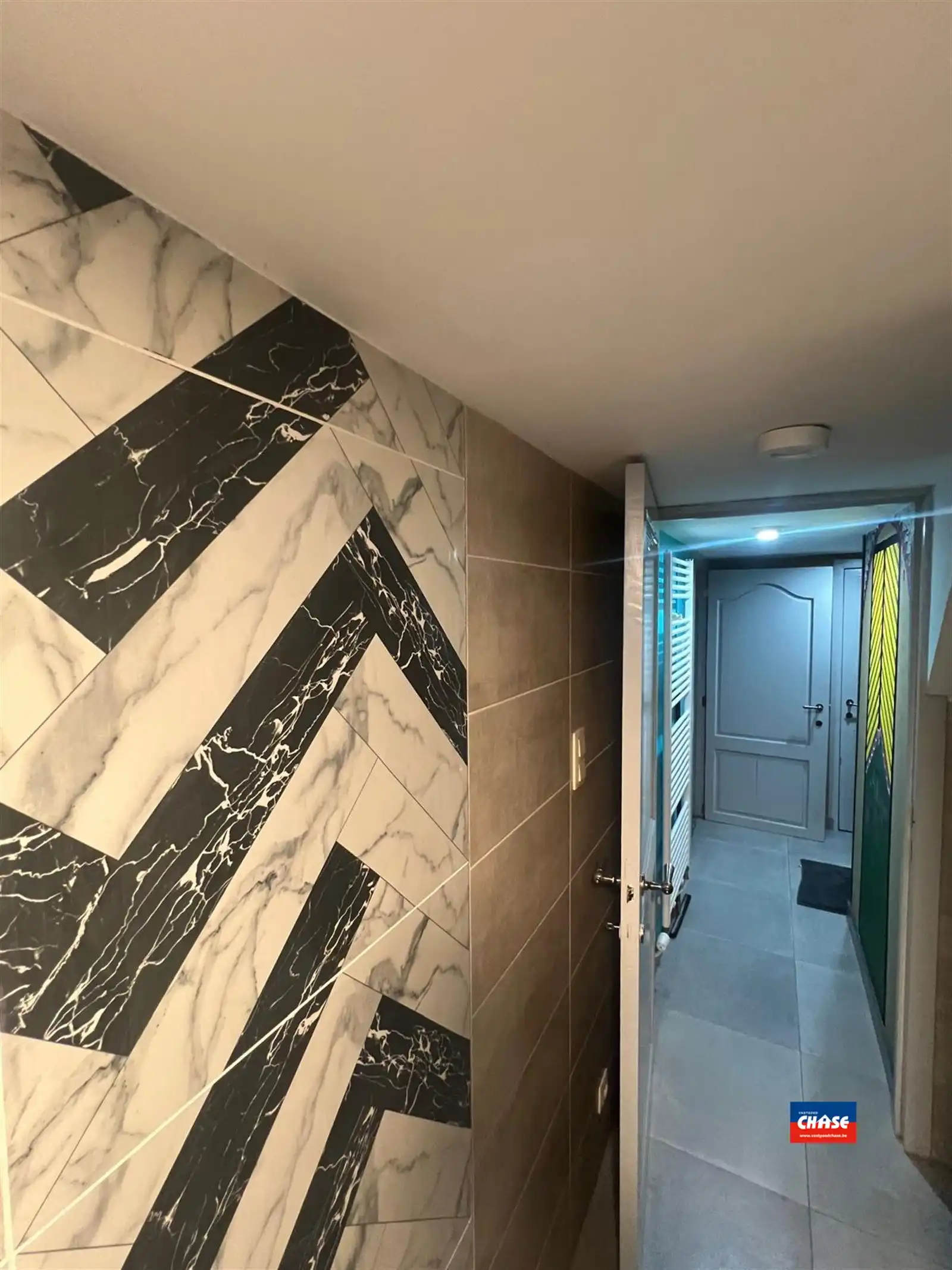 Instapklare bel-étage met 2 slpks, garage en tuin foto 20