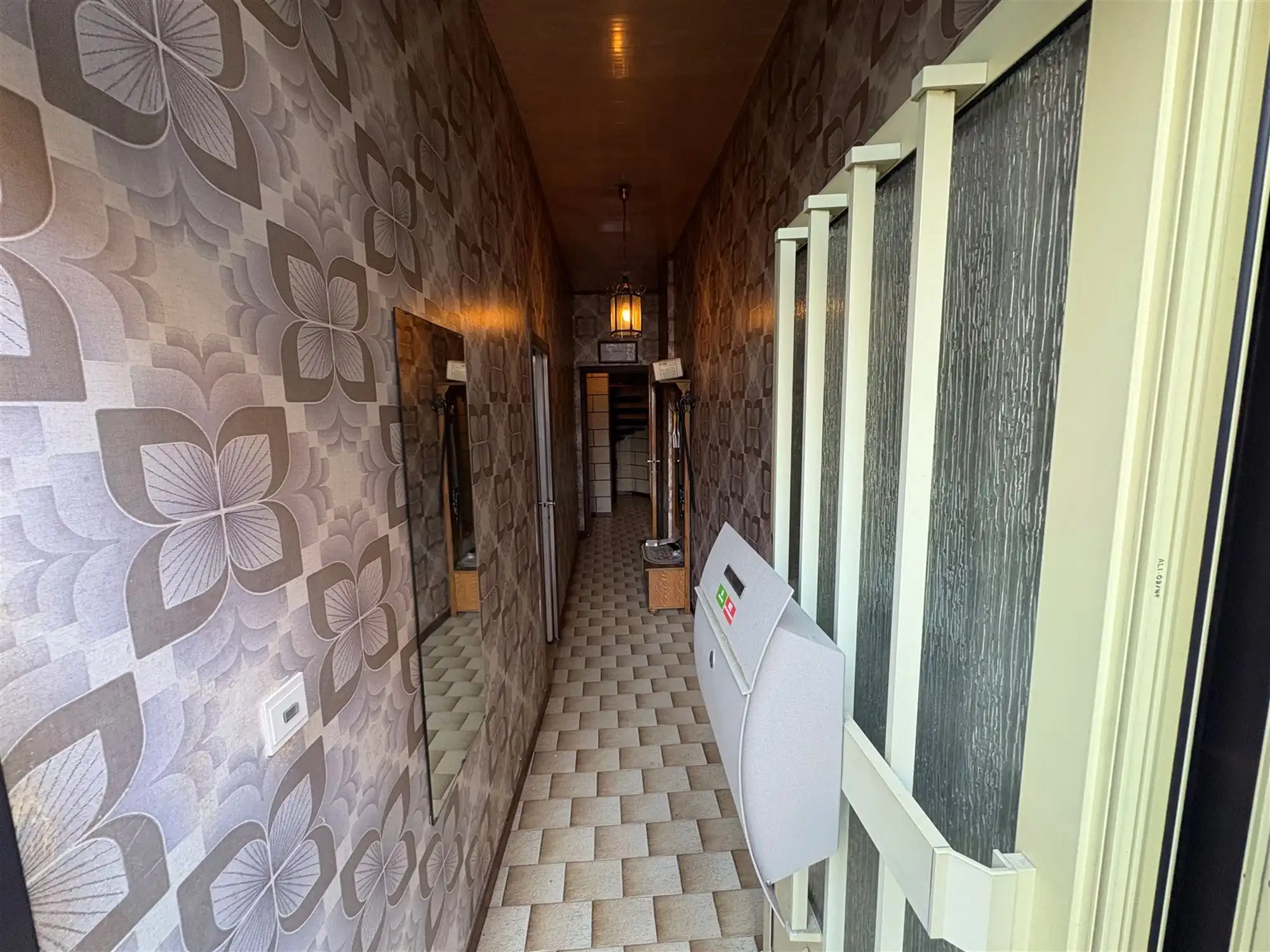 Bel-etagewoning met garage aan Sint-Andriesplaats. foto 4