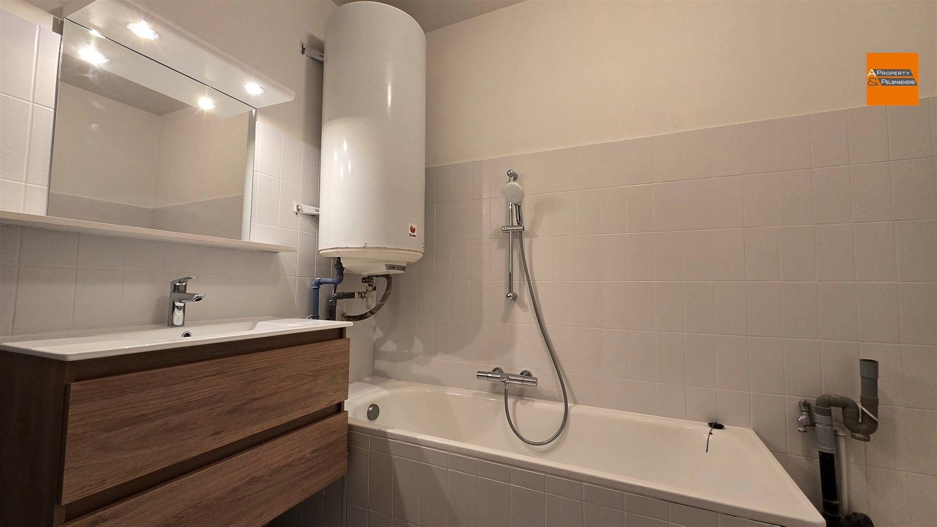 Ruim en lichtrijk appartement met terras en garagebox te huur in Herent foto 11