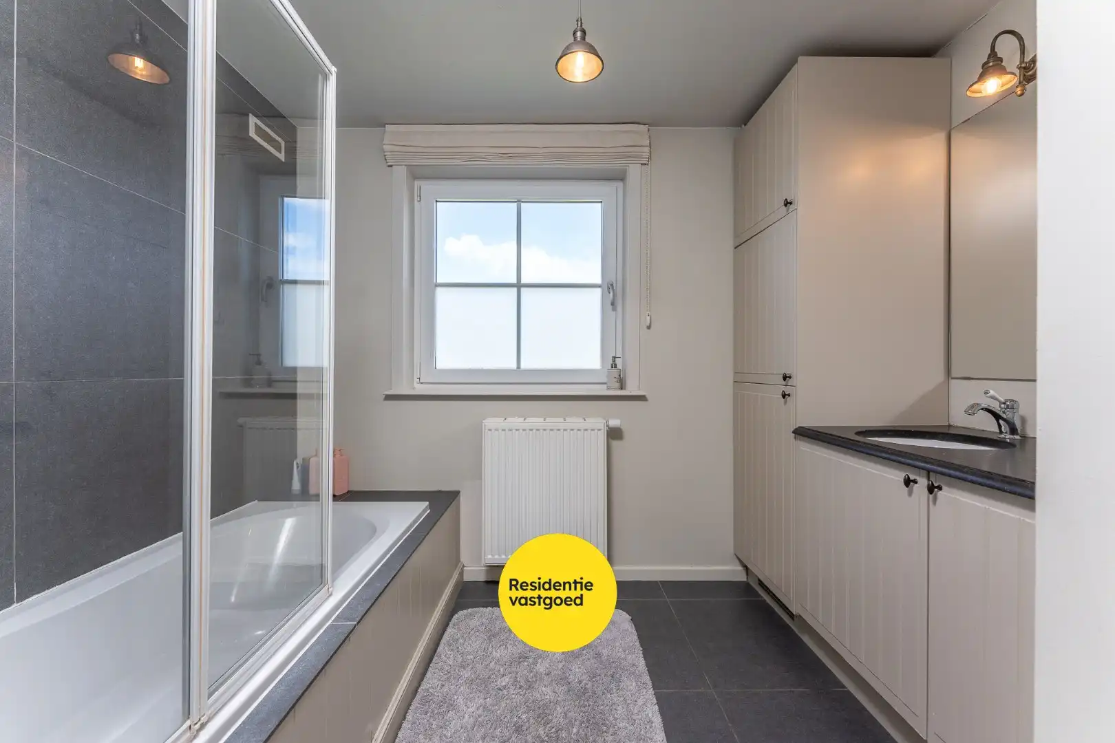 Exclusieve villa met zwembad en poolhouse in de nieuwe St-Annawijk te Sint-Andries foto 27