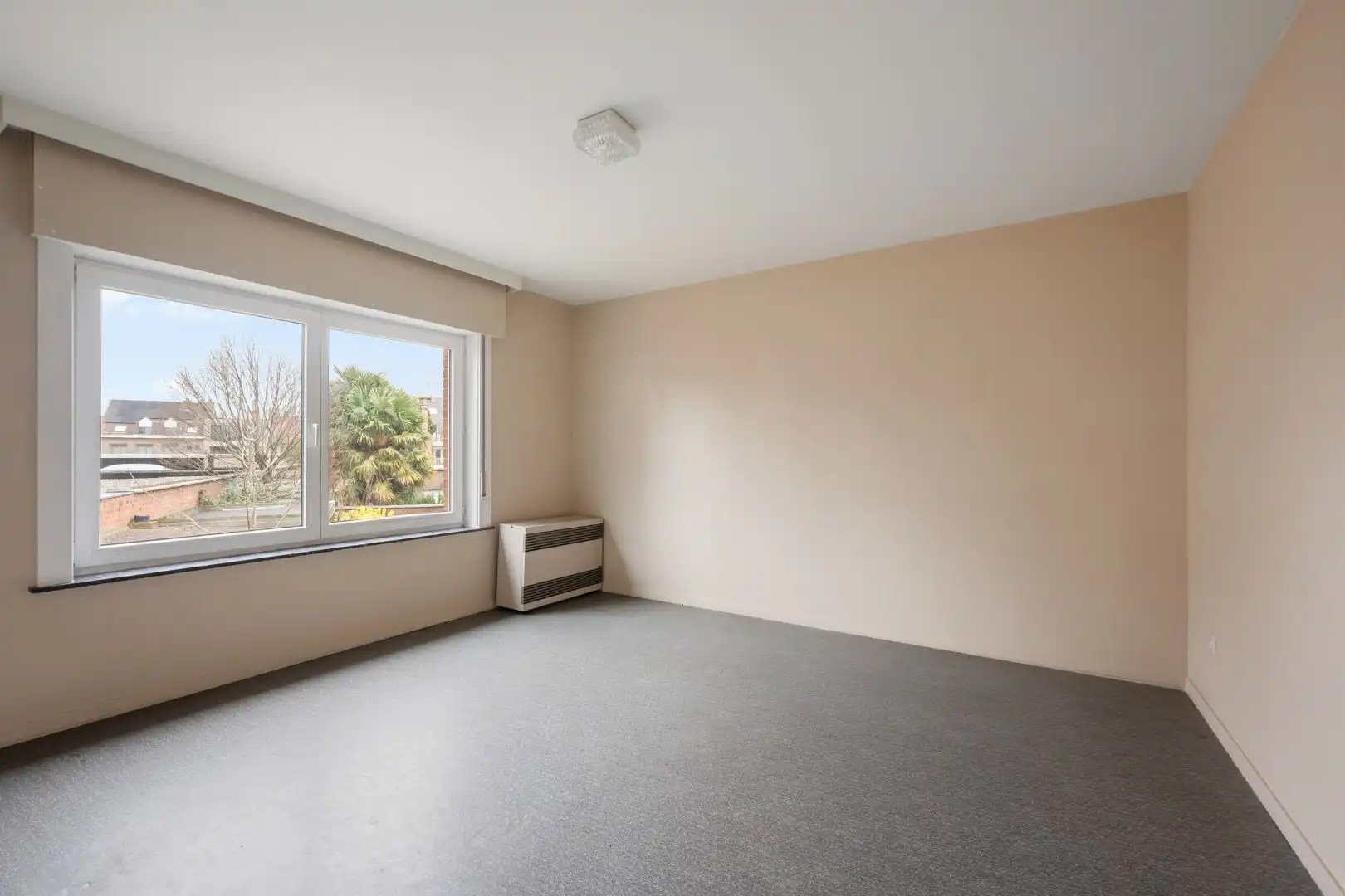 Woning met 3 slaapkamers, zolder, garage en tuin in het centrum van Dadizele foto 11