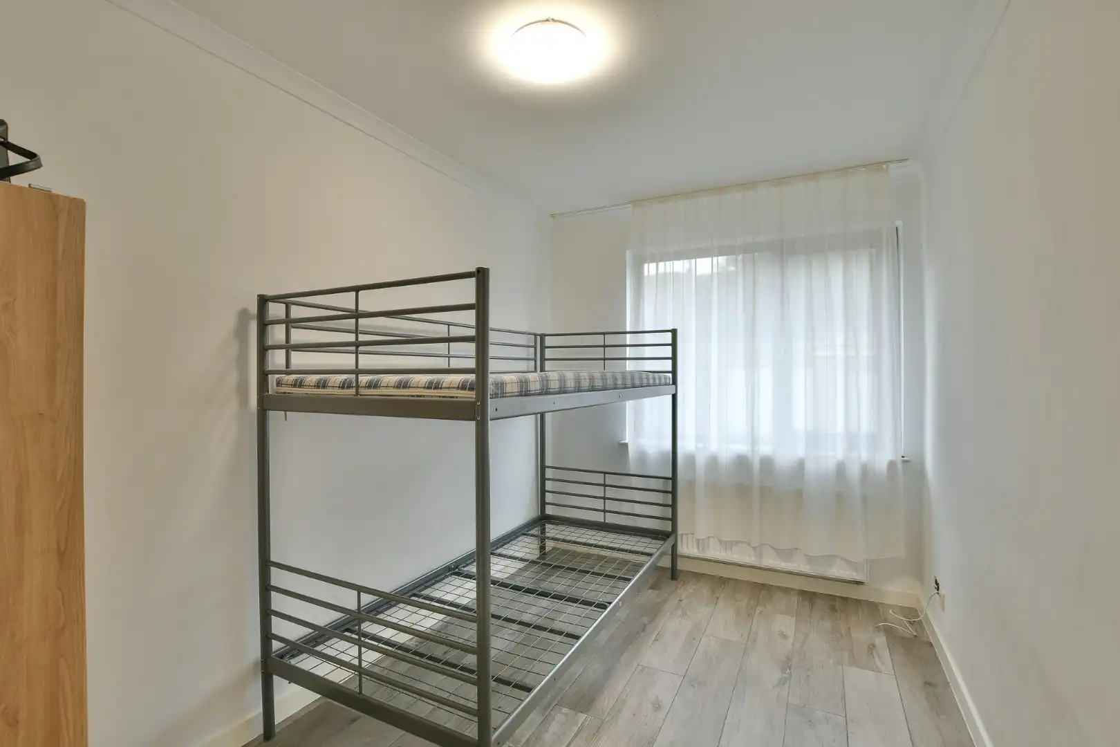 Gelijkvloers 2-slaapkamerappartement foto 9