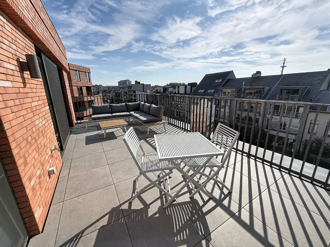 Recent penthouse in het centrum van Dendermonde mét ruim terras. foto 12