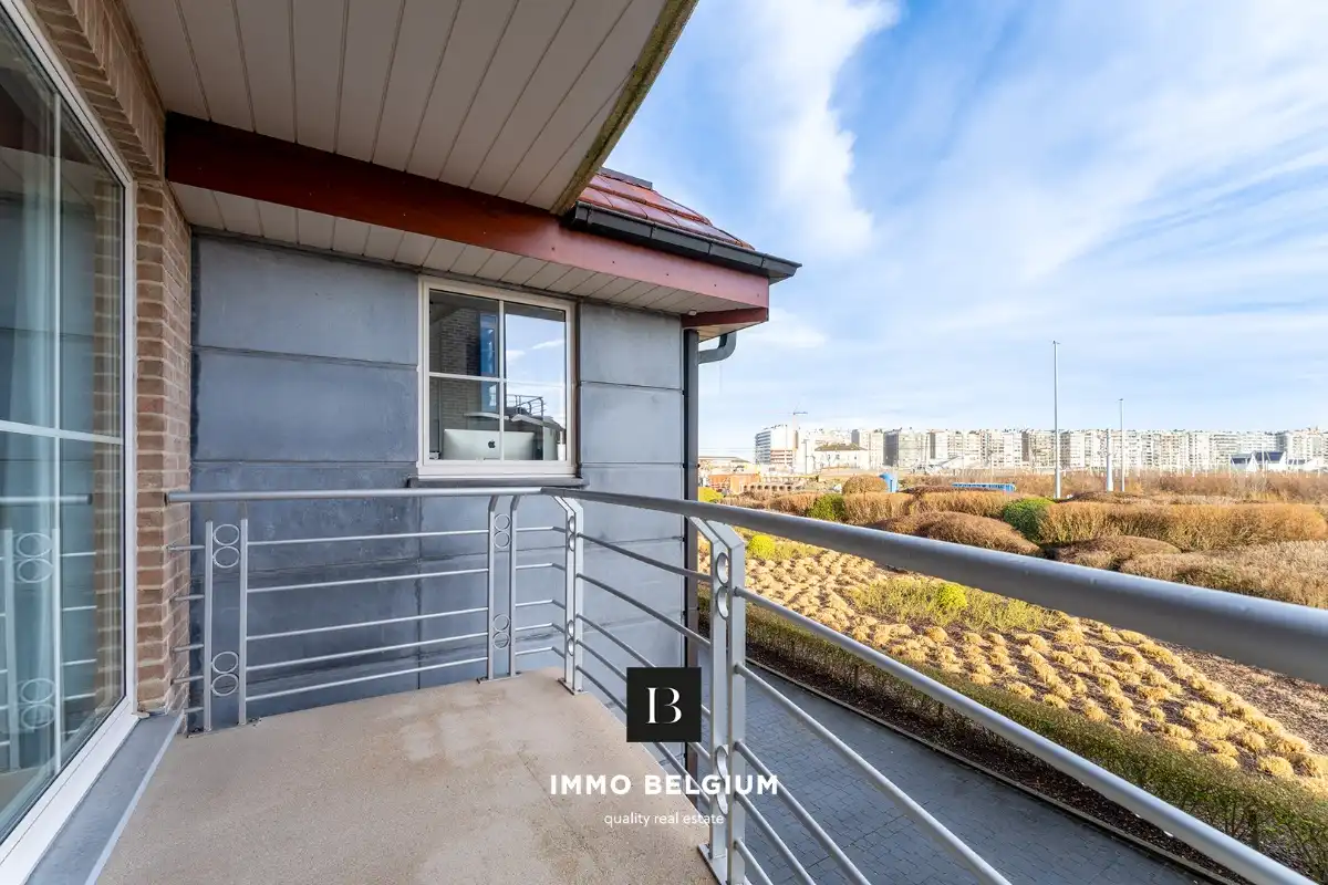 Zeer ruim appartement (133m²) met garagebox foto 14