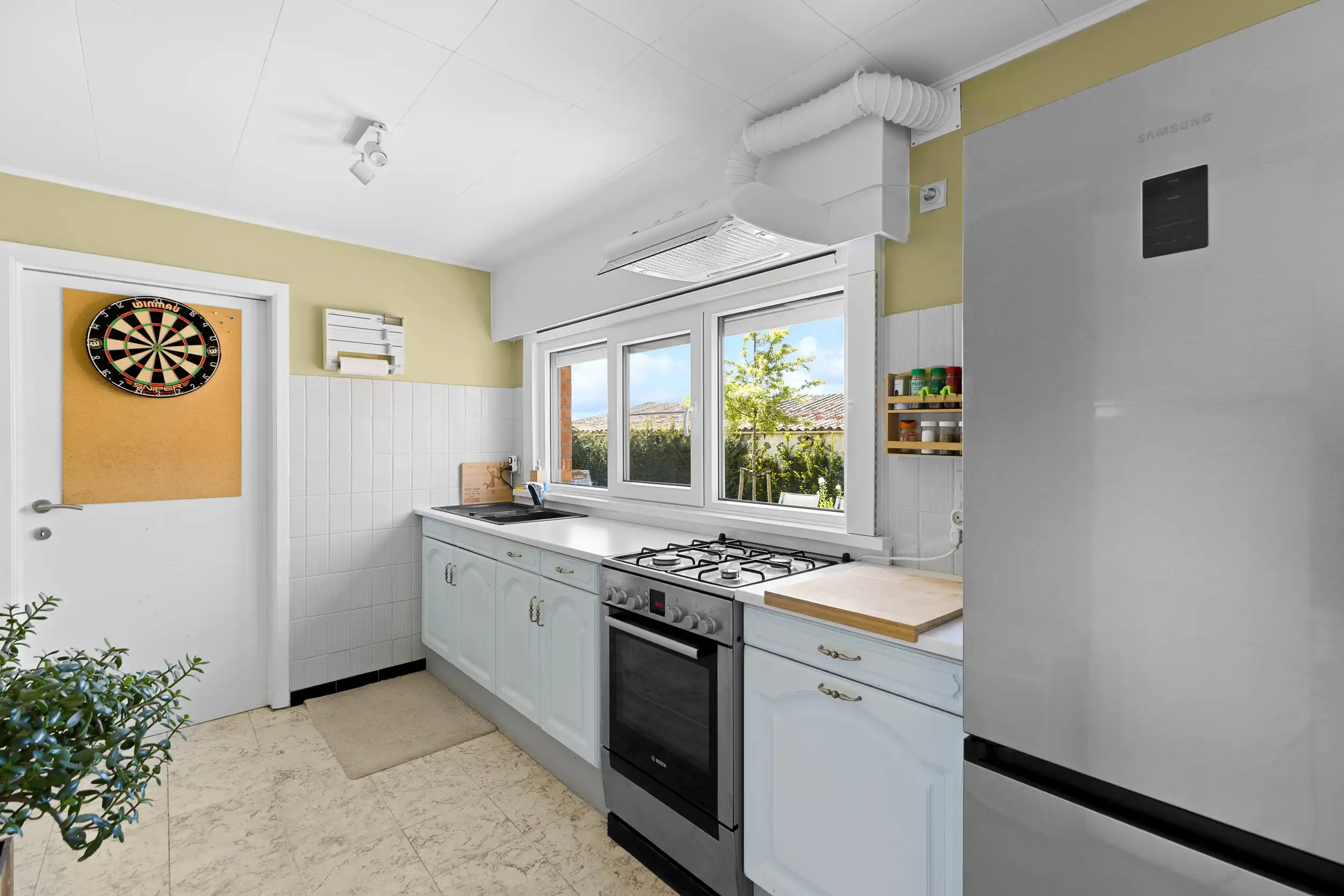 Gelijkvloers wonen met tuin en potentieel foto 6