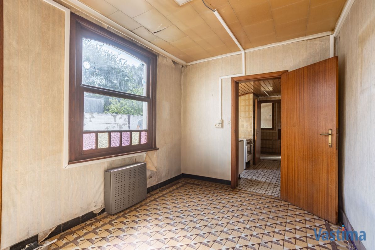 Renovatiewoning met aanpalende bouwgrond nabij centrum Erembodegem foto 10