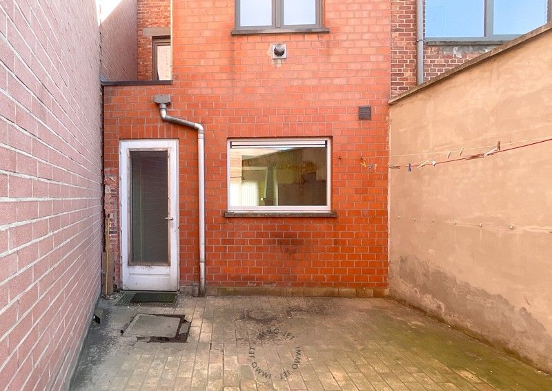 Woning met 2 slaapkamers en koer in het centrum van Sint-Gillis-Waas foto 11
