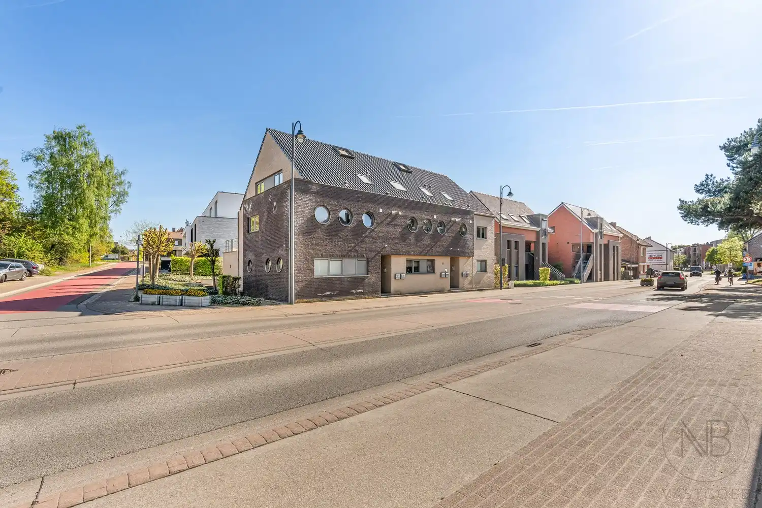 Ruim duplex appartement met 3 slaapkamers en groot terras in hartje Zutendaal foto 3