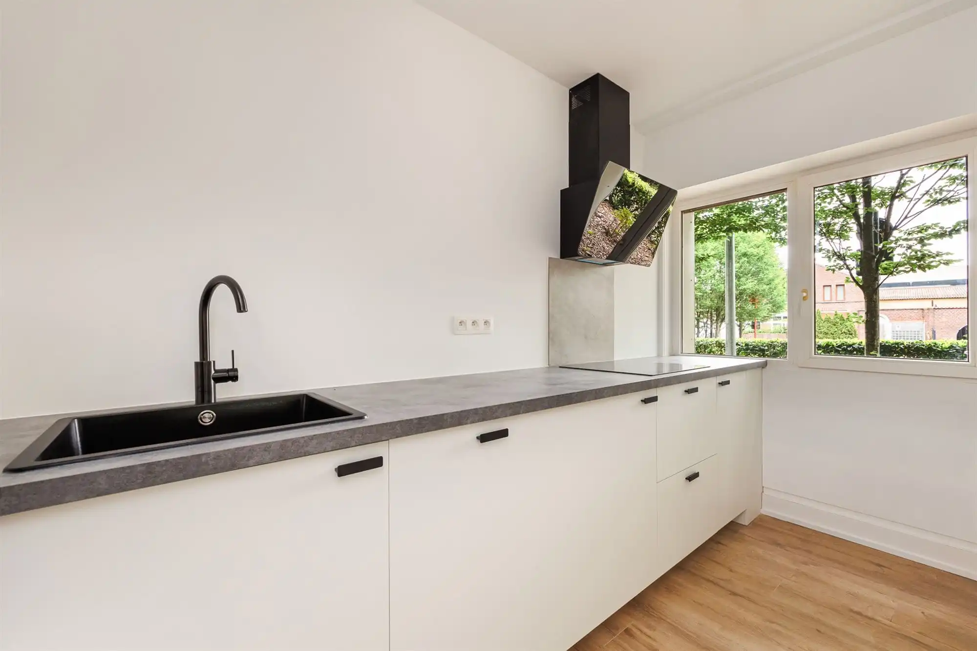 Lichtrijk gelijkvloersappartement met 2 slpk op TOPlocatie foto 11