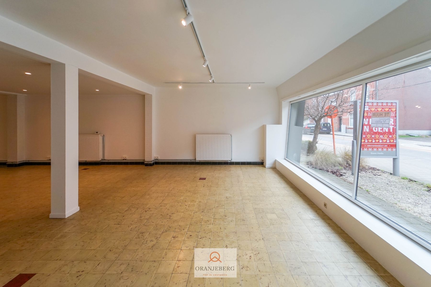 Ruim handelspand met meerdere ruimtes en parking te huur in centrum Drongen foto 9