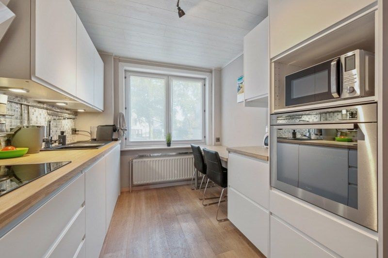 Instapklare bel-etagewoning met garage, tuin en veel potentieel foto 11