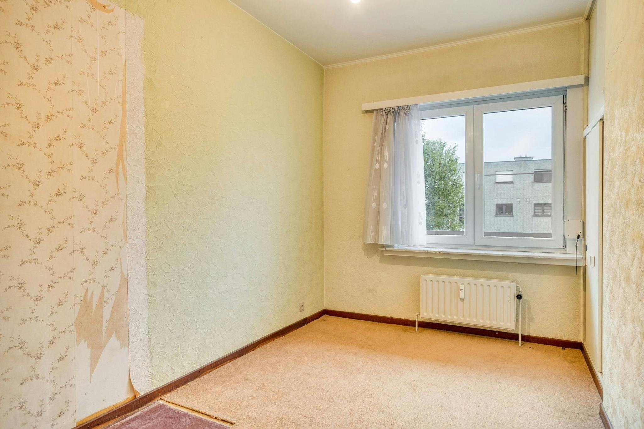 Appartement met 2  a 3slaapkamers en garage te koop in Hoevenen! foto 14