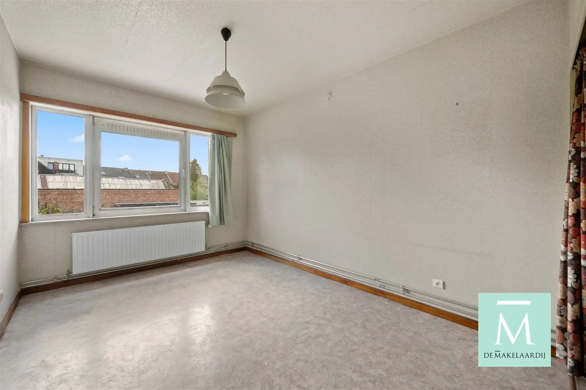 Ruime woning met 3 slaapkamers, aangename tuin en inpandige garage foto 10
