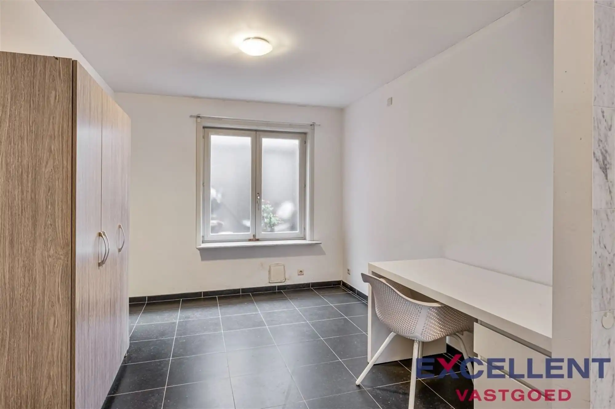 Gelijkvloerse handelsruimte met studio centrum Deinze te koop foto 9