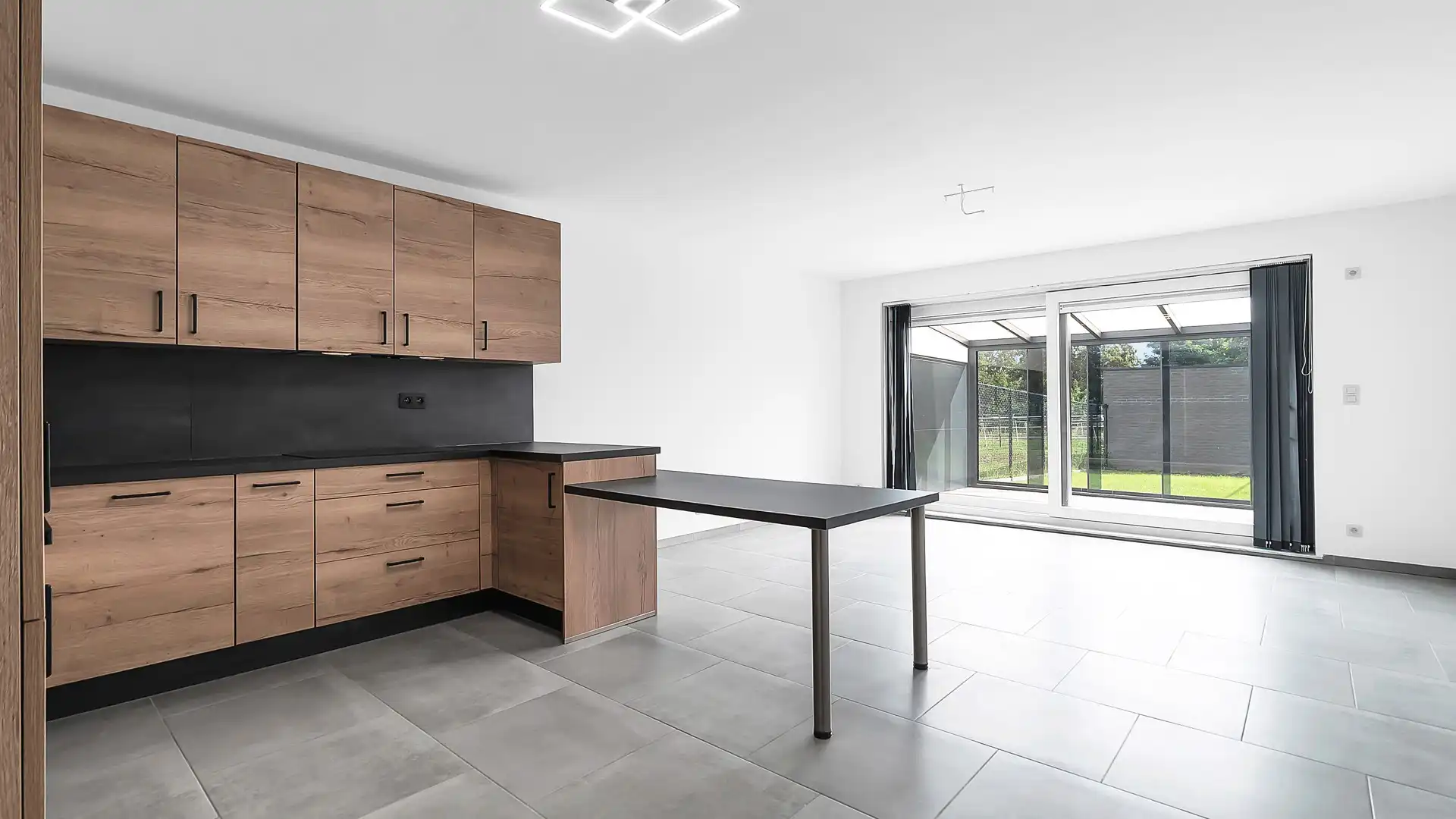 Gelijkvloers appartement met privatieve tuin, volledige onderkelderd en uitzonderlijk gunstig EPC foto 3