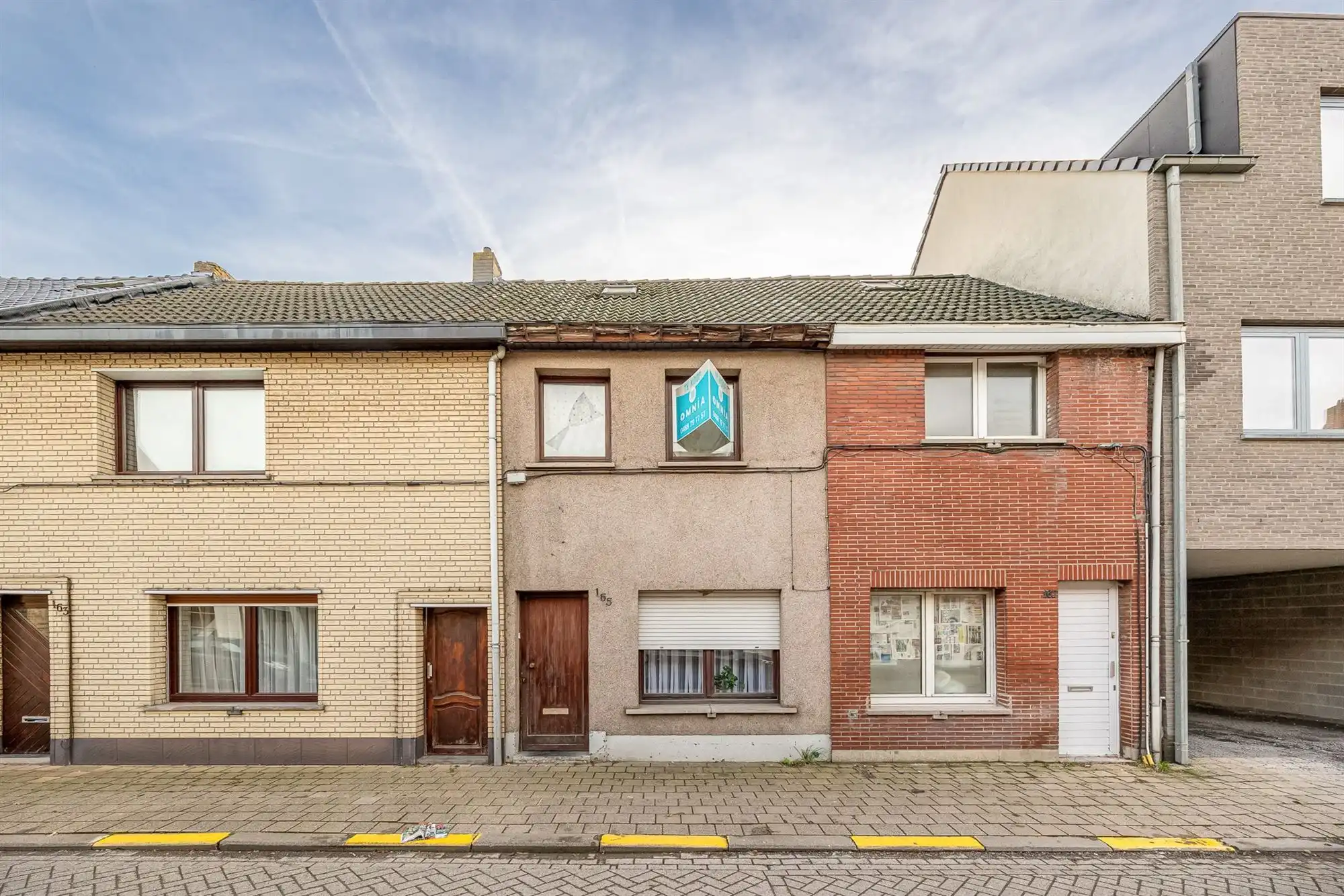 Opnieuw te koop: Te renoveren arbeidersw. met 3 slpk. en tuin foto {{pictureIndex}}