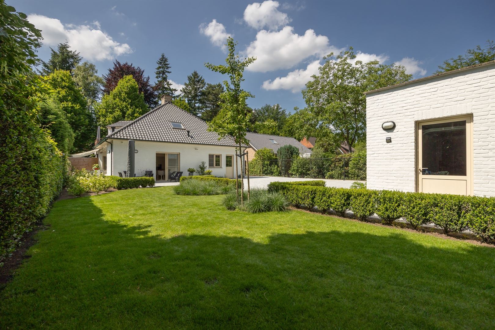 Een moderne villa met 4 ruime SLKS  nabij het centrum van Heide- Kalmthout. foto 3
