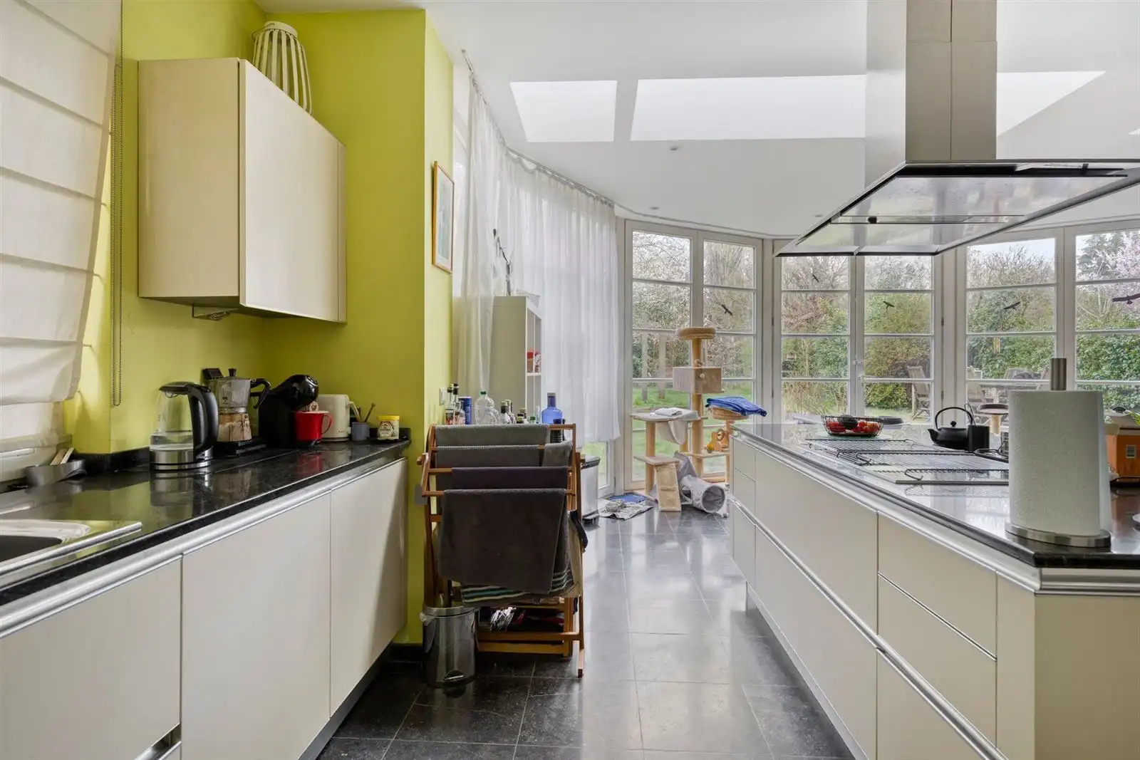 Gelijkvloers appartement (159m²) met prachtige tuin foto 9