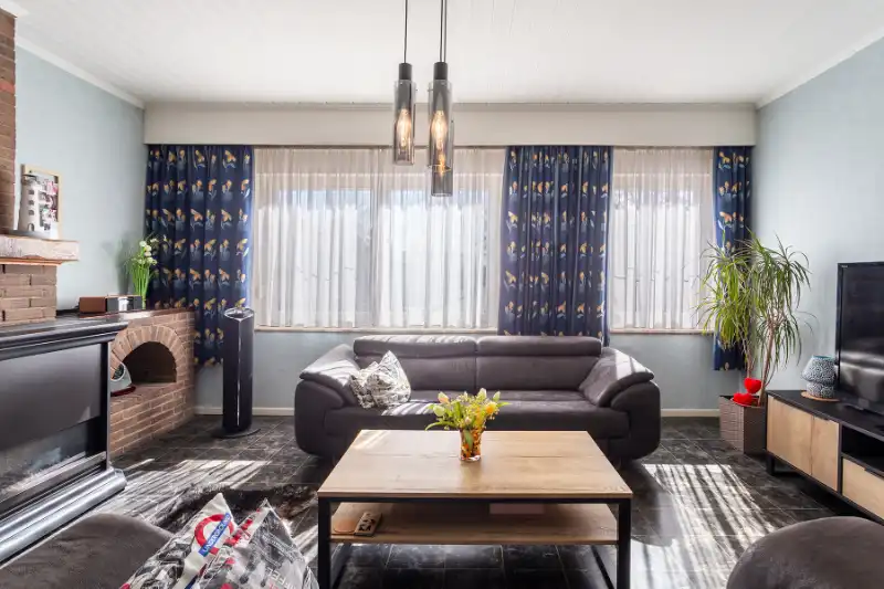 Uiterst ruime woning, veel lichtinval, mooie tuin, instapklaar! foto 4