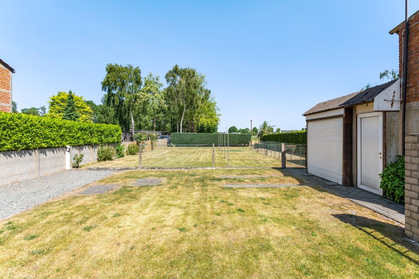 Tof gelegen, te renoveren woning met 2 slpk., garage en tuin foto 27