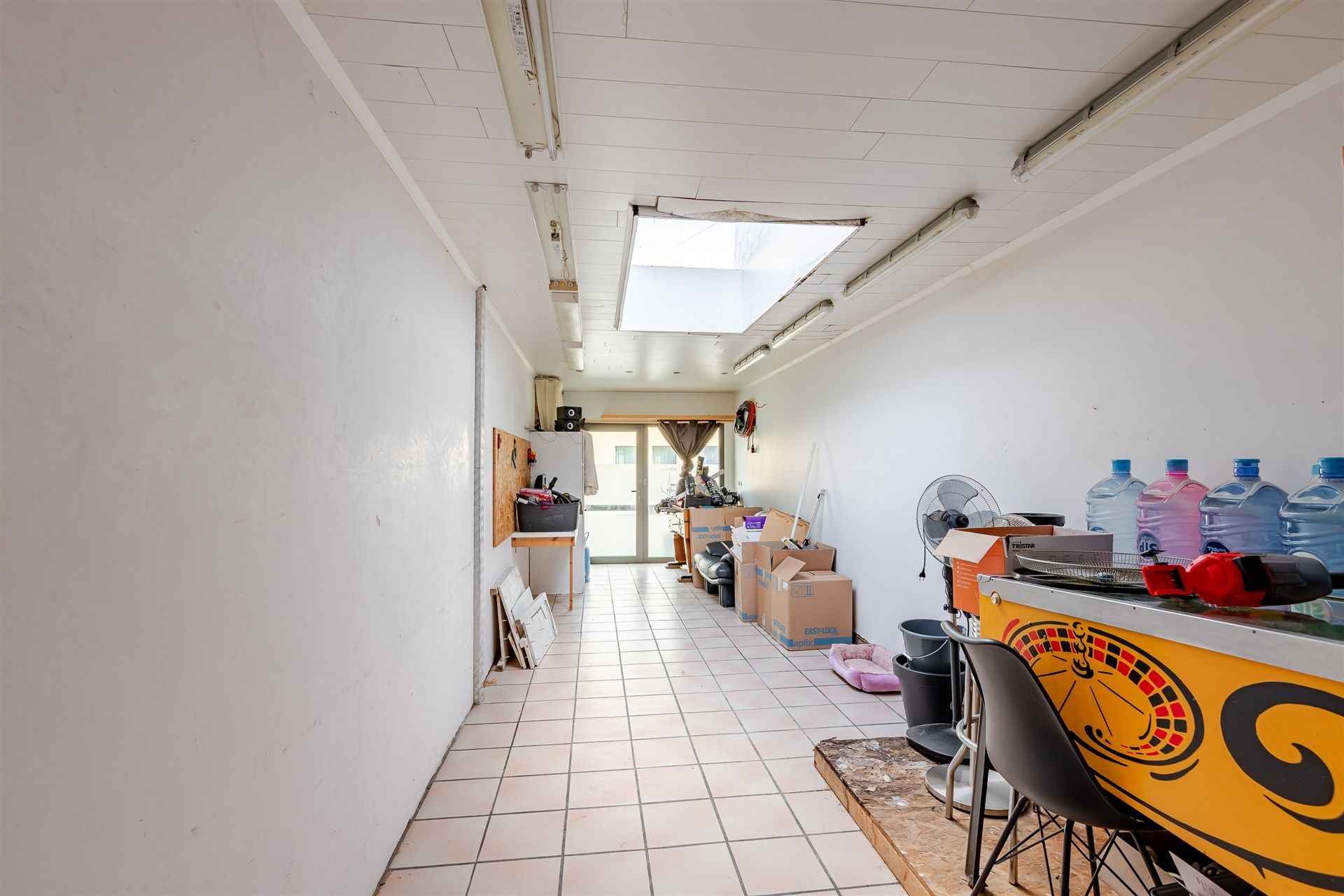 Bijzonder ruime woning met diepe tuin in Wetteren centrum foto 8