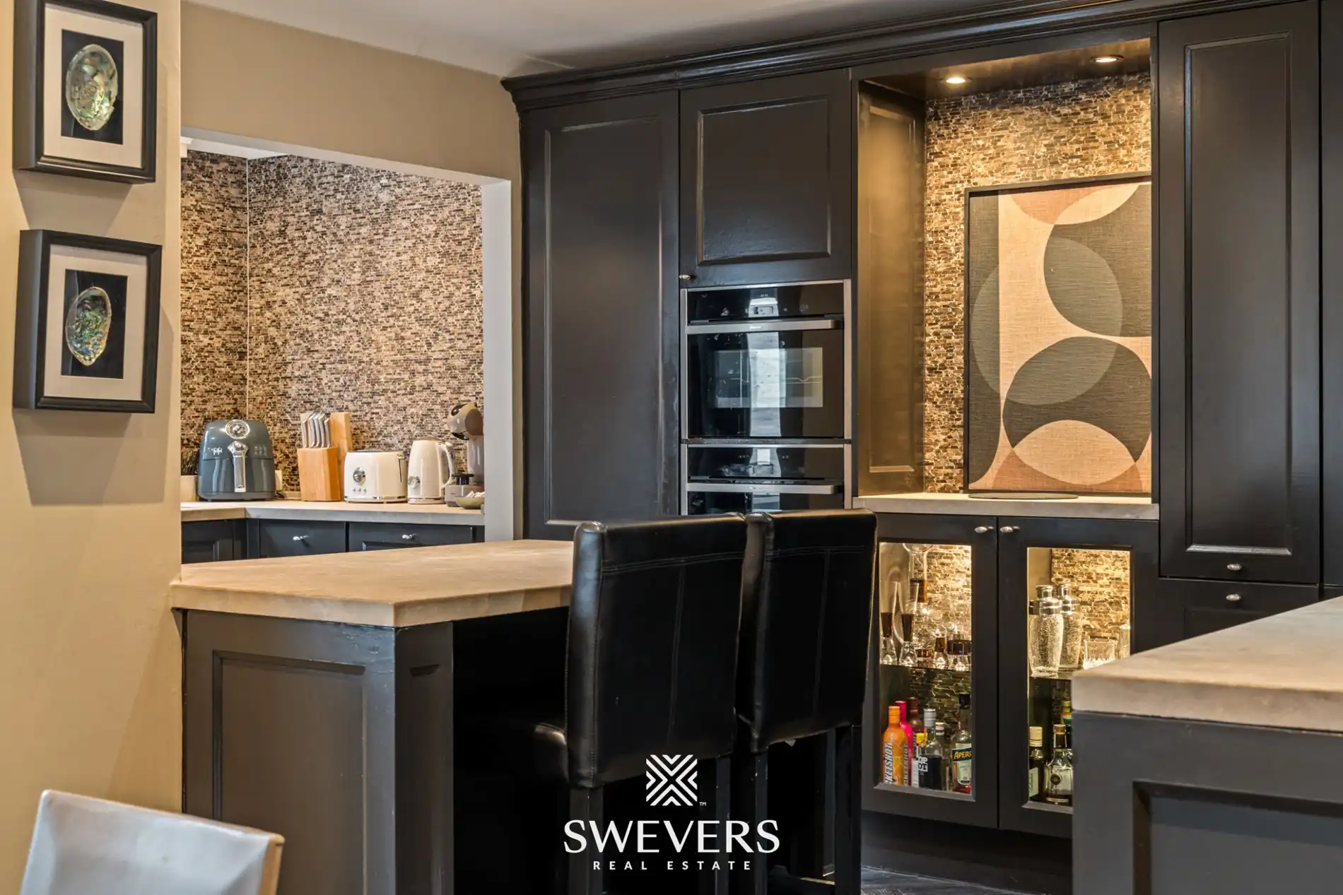 Exclusief gerenoveerde stadswoning met garage en drie terrassen in hartje Hasselt foto 13