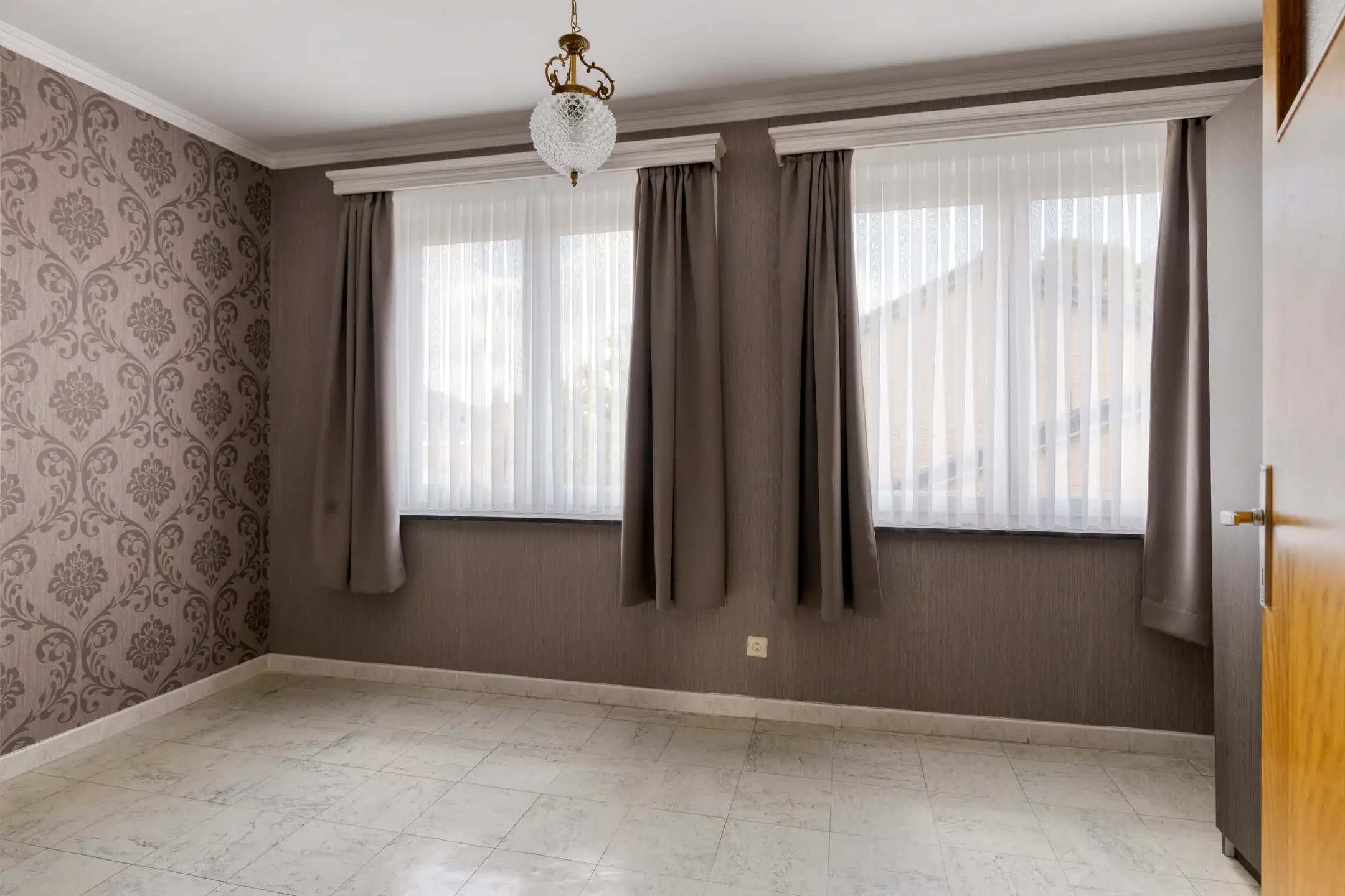 Ruime 3-gevelwoning met 4 slaapkamers en tuin te koop foto 9