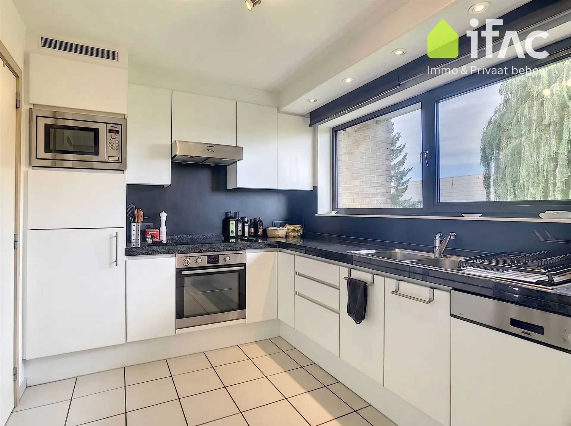Prachtige duplex met 3 slaapkamers, garage en tuin foto 10