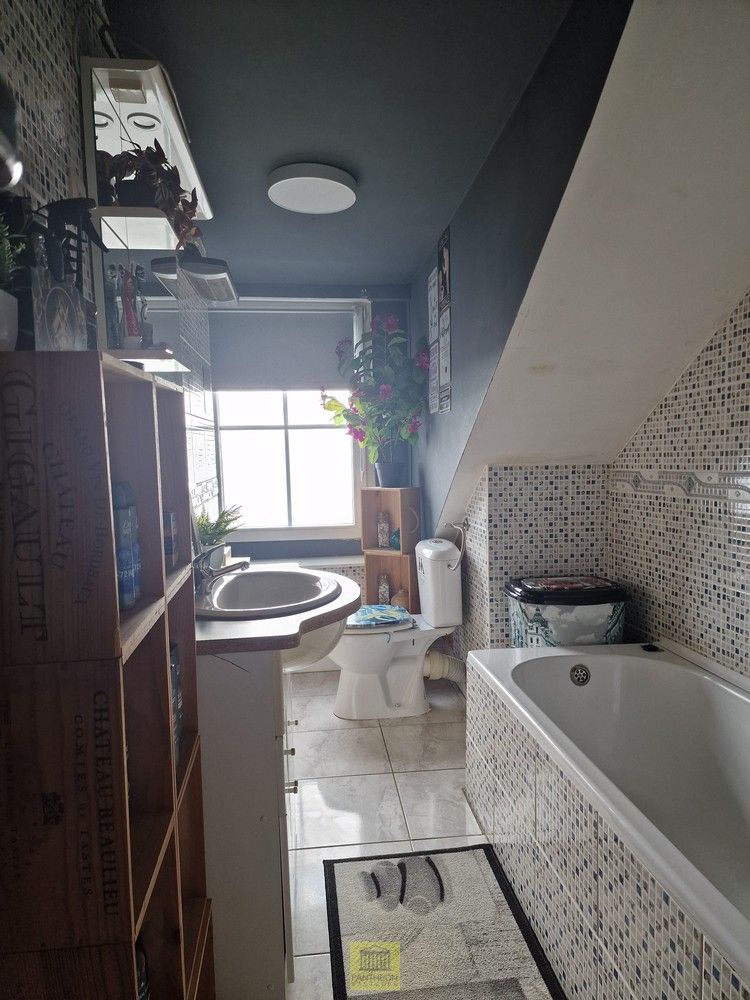 Topper: Opbrengsteigendom met 2 verhuurde appartementen op superlocatie foto 16