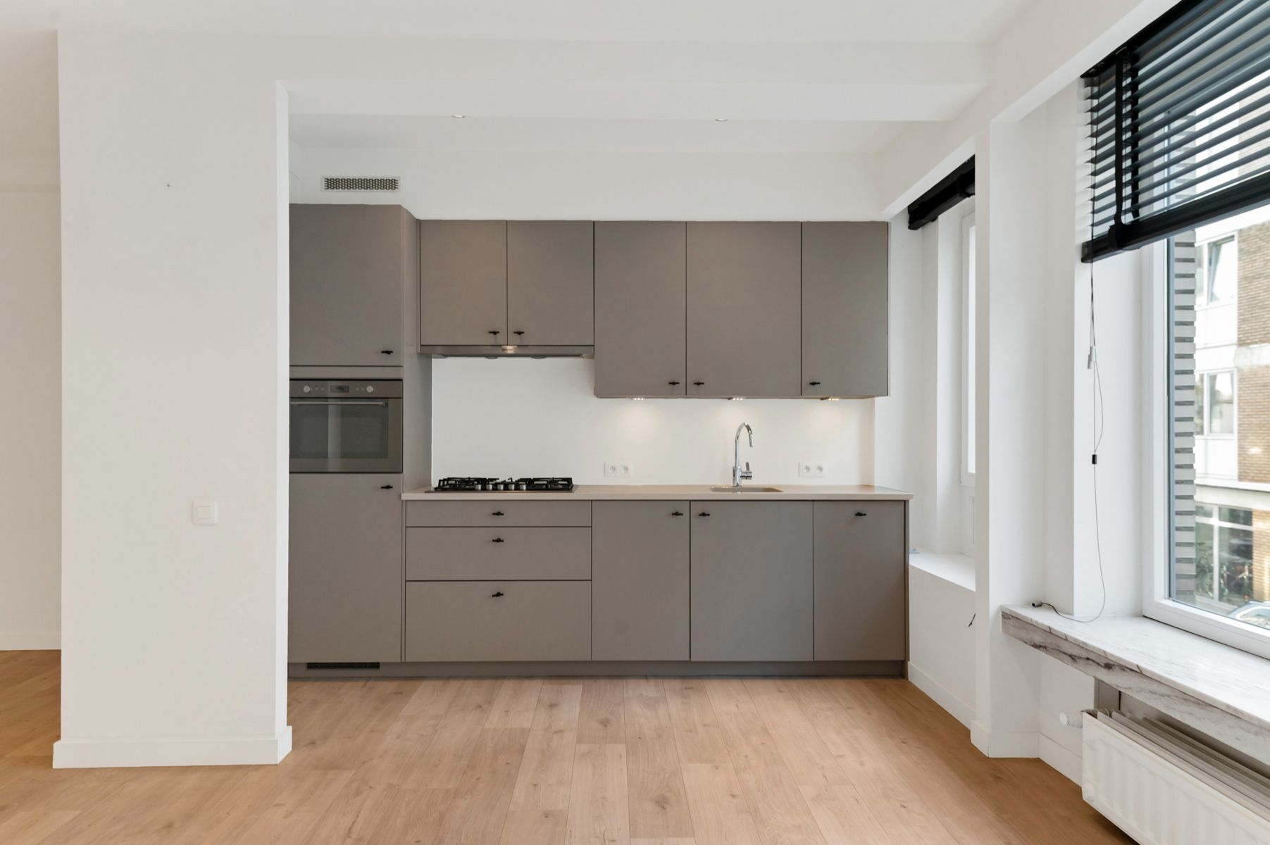 Modern wonen met vibe: stijlvol appartement met tuin foto 2