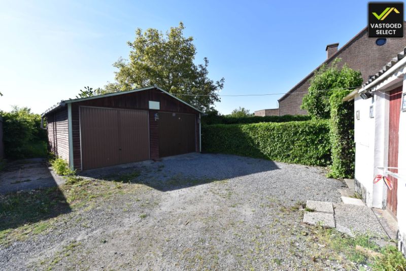 Vastgoed Select: Halfopen bebouwing met zonnige tuin, garage en renovatiepotentieel in Eeklo foto 14
