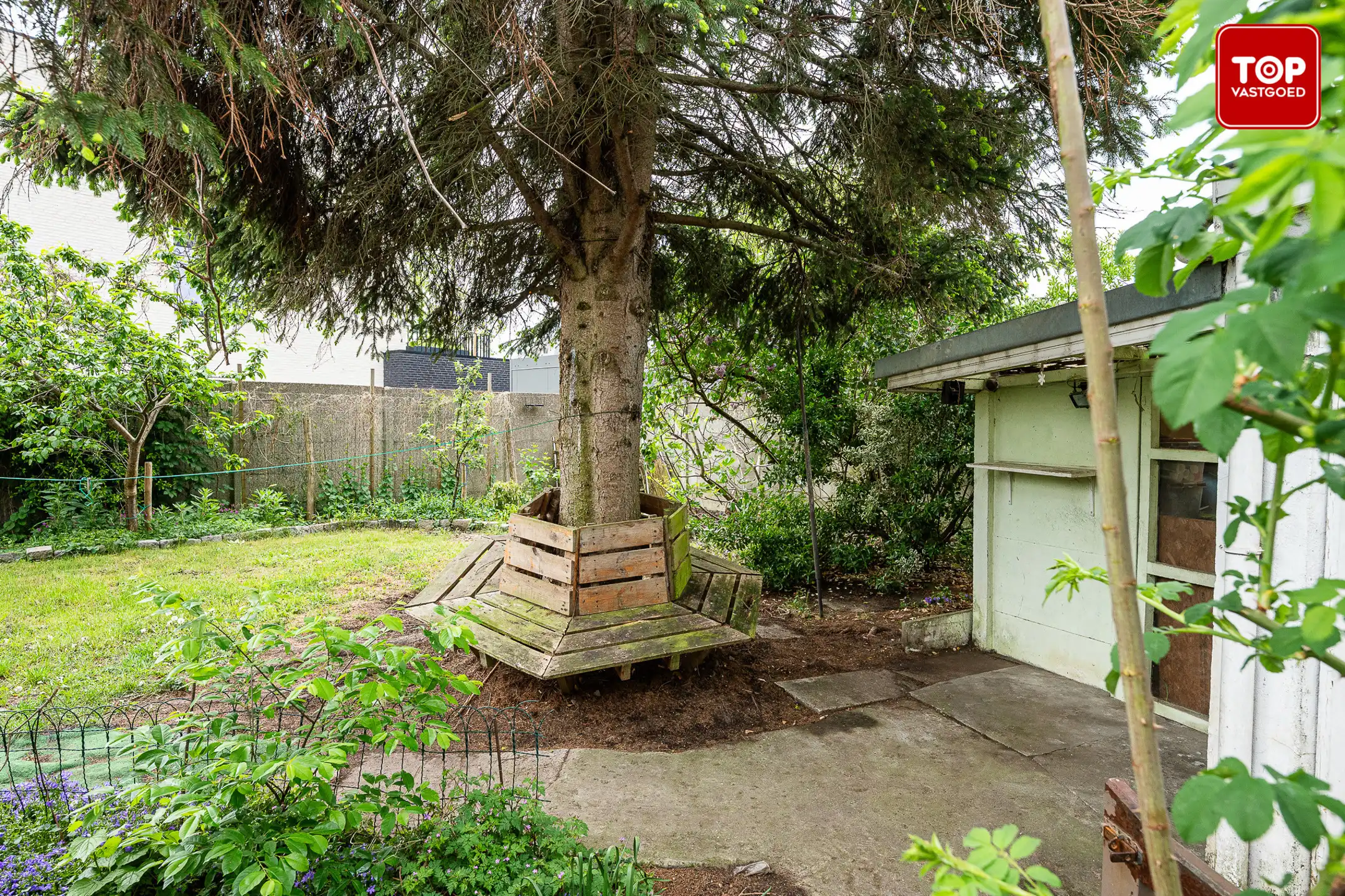 Woning met 3 slaapkamers en leuke tuin op toplocatie. foto 26
