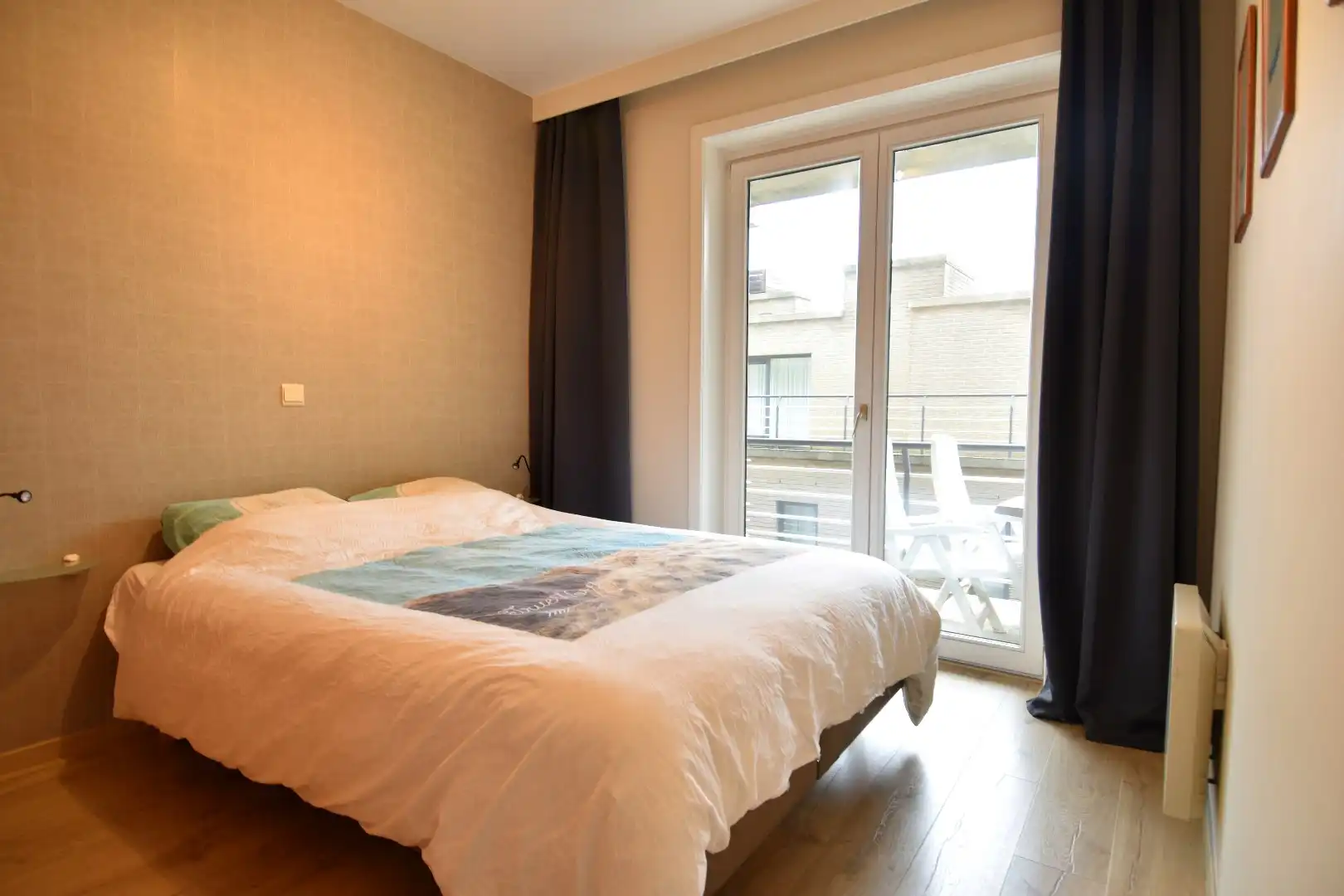 Appartement met frontaal zeezicht op de zeedijk in Nieuwpoort foto 13