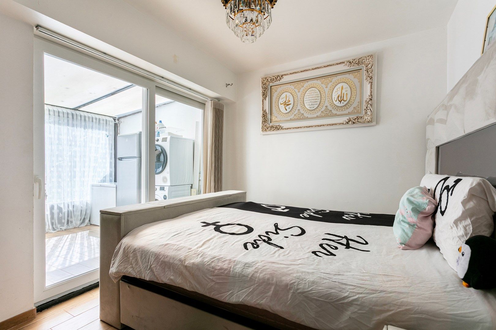 Gerenoveerd gelijkvloers appartement met grote tuin! foto 9