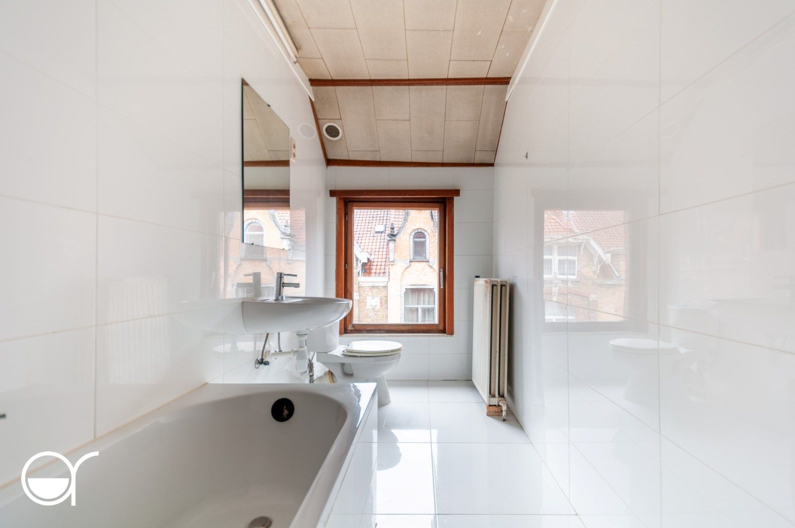 Opbrengsteigendom met 2 appartementen gelegen vlakbij het Sint-baafskouterpark & Rozebroeken.  foto 24