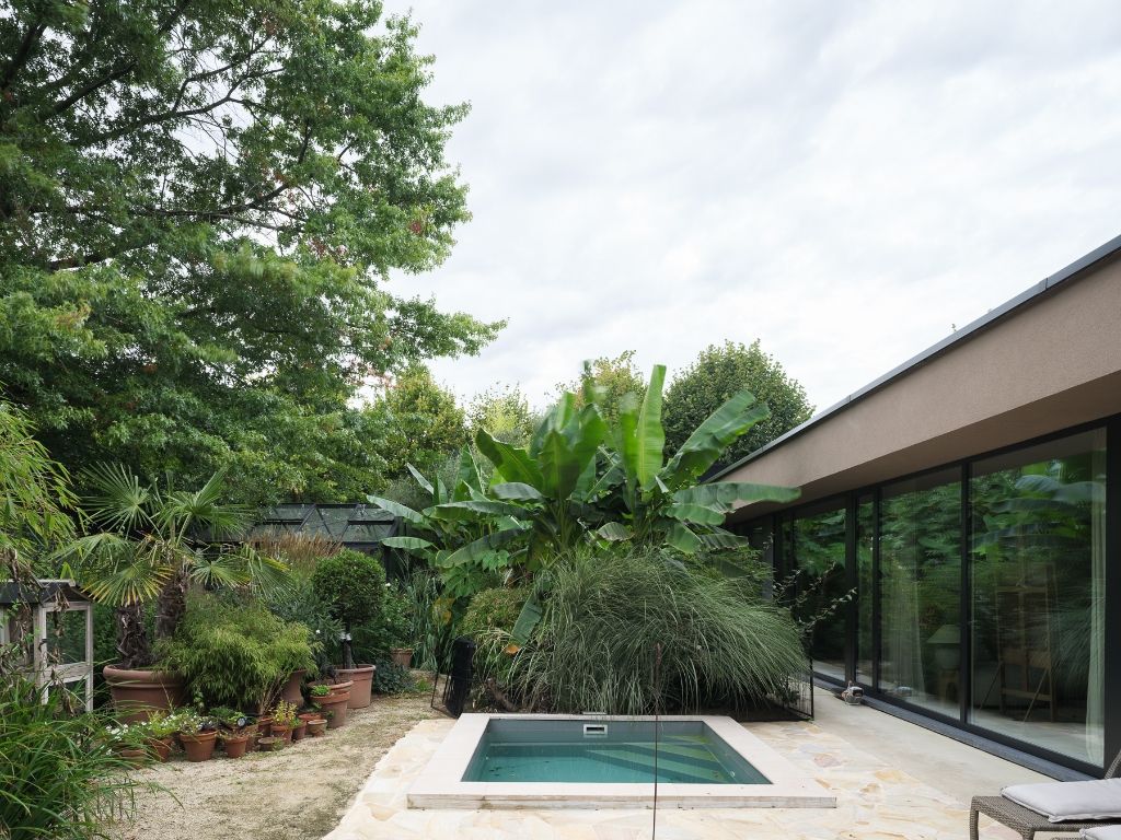 Twee uitzonderlijke bungalowvilla’s op één groen perceel van 3.241 m² in een residentiële wijk in De Pinte. foto 8