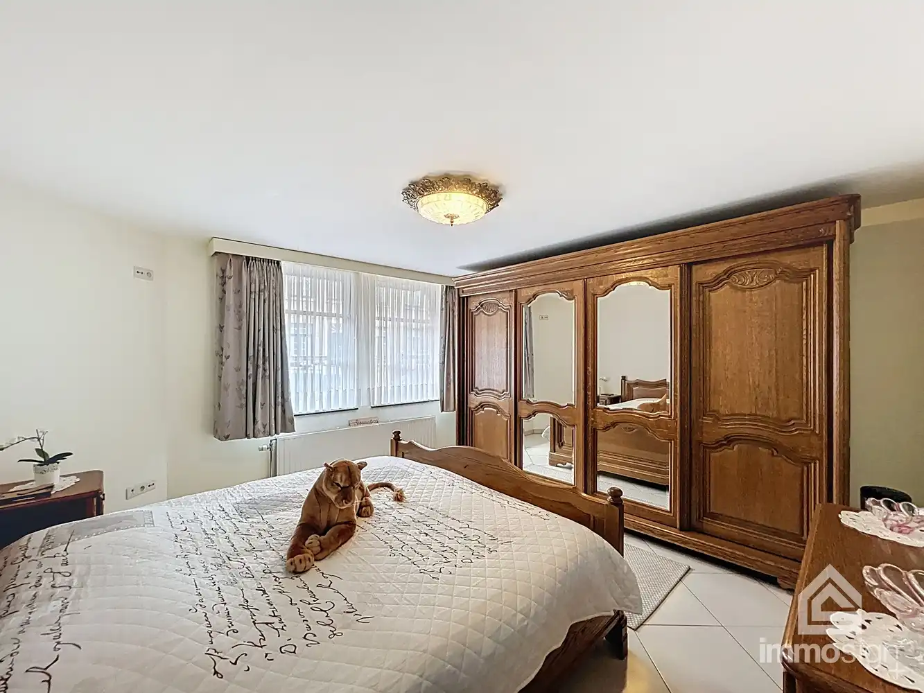 Appartementsgebouw met gelijkvloers- en duplexappartement in Peer centrum! foto 15