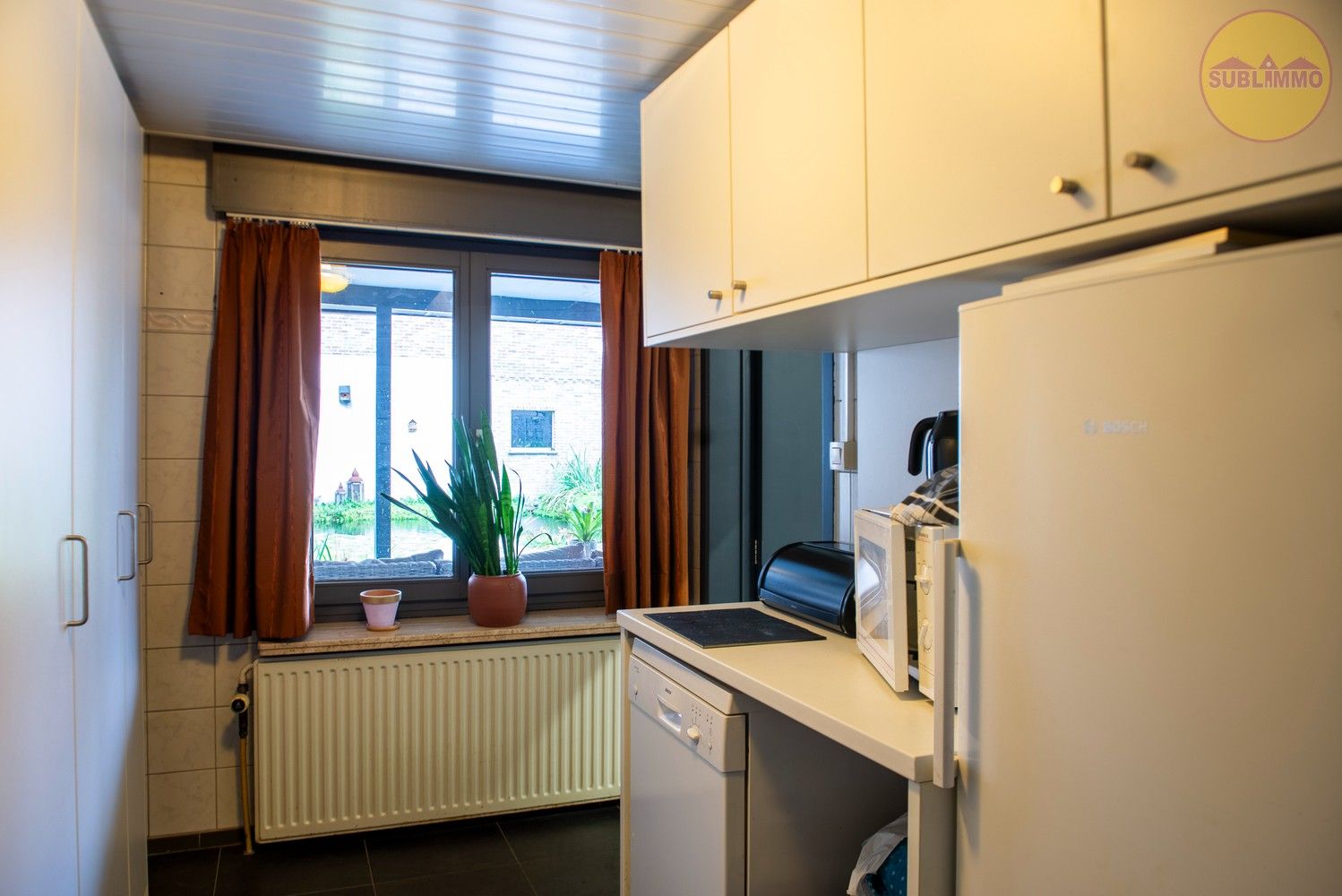 Uniek handelspand met woonst, tuin en tal van mogelijkheden – ideaal als winkel, kantoor, horecazaak, B&B,... foto 18