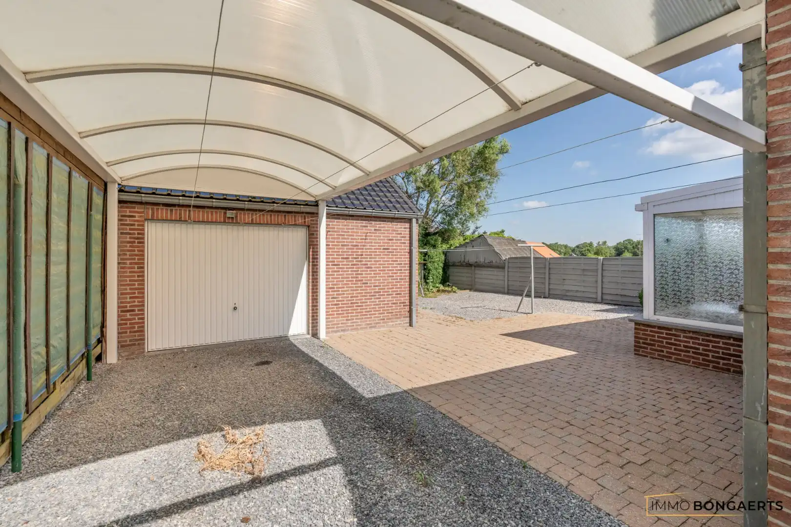 Woning met onderhoudsvriendelijke tuin foto 23