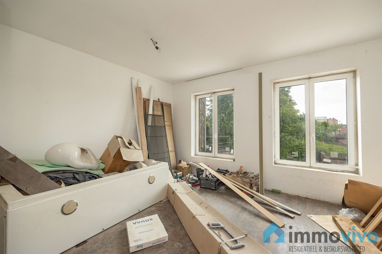 Charmant herenhuis met tuin in verder af te werken toestand foto 12