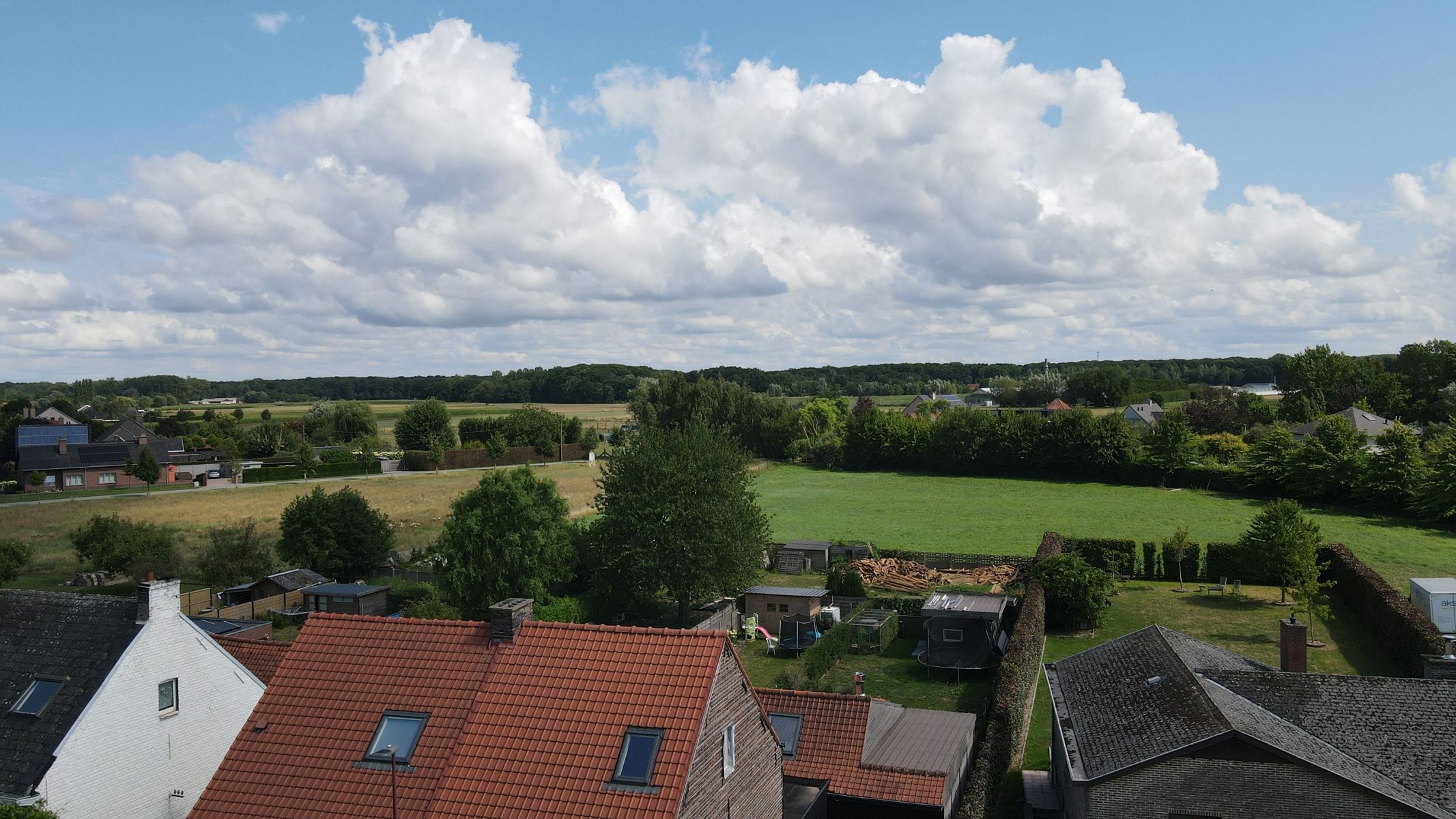 Instapklare halfopen woning met ZO-tuin én garage in Melsen! foto 27